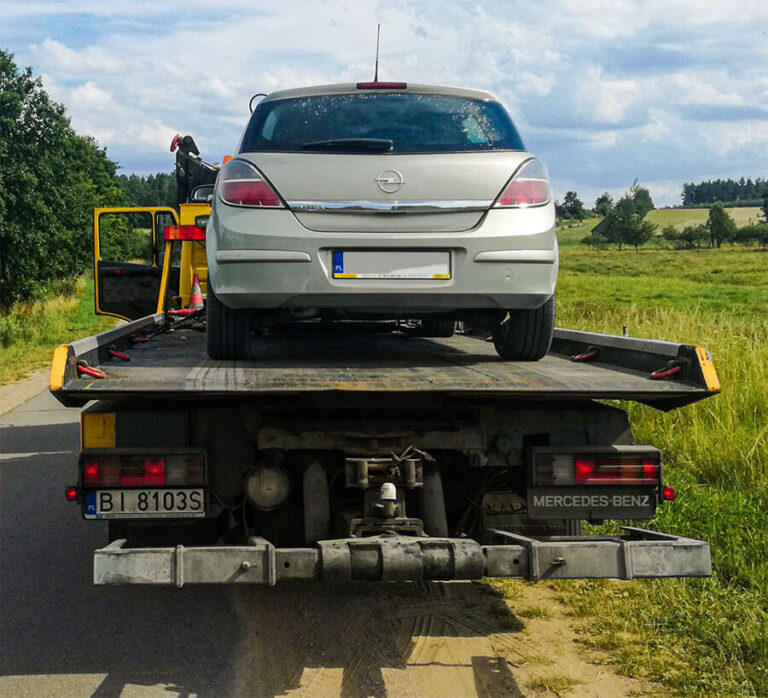 Pomoc drogowa w Białymstoku. Laweta Motofirma.